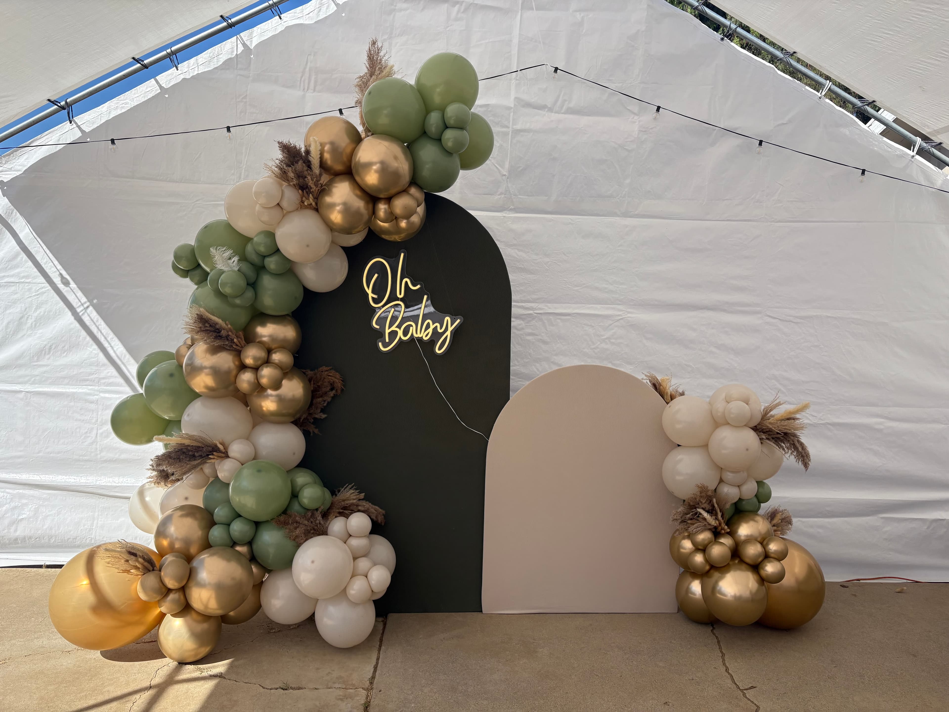 green, tan, and gold balloons decoration